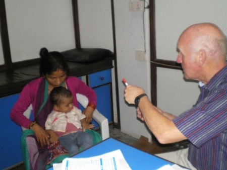 Prof. Victor Paterson examines patients from Char Bhanjyang Centre for Health